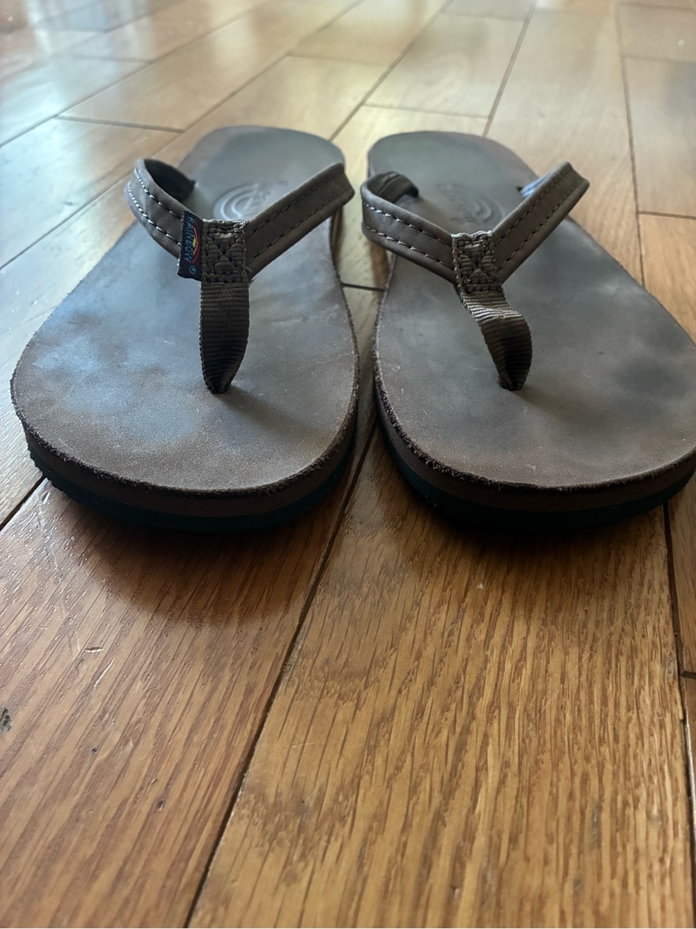 Women’s size XL leather rainbow flip flops. Single layer, thin strap